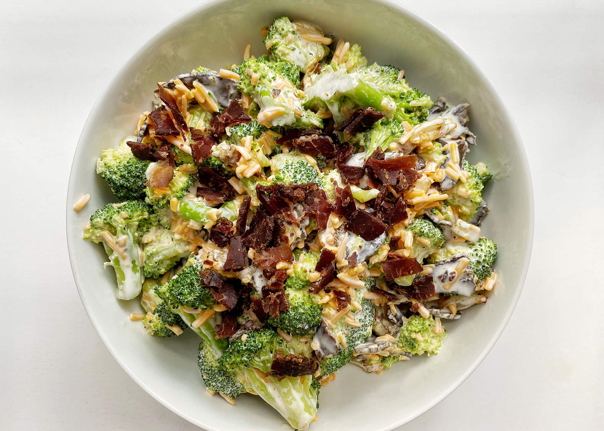 Beef Biltong Keto Salad with Broccoli in white bowl.